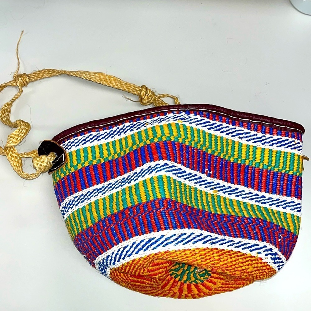 Large Boho styled rattan and leathered bag, bright colored weaving